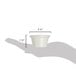 A hand holding a white Carlisle plastic ramekin with measurements.