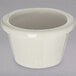 A white Carlisle plastic ramekin with a rim.