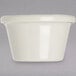 A white Carlisle plastic ramekin with a lid.