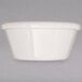 A Carlisle bone white plastic ramekin.