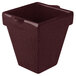 A maroon square cast aluminum pot with a handle.