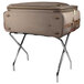 A brown suitcase on a CSL metal folding luggage rack with black straps.