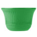 A green cast aluminum bowl with a rippled design.