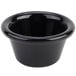 A Carlisle black plastic ramekin on a white background.