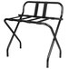 A CSL black metal folding luggage rack with black straps.