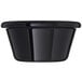 A close-up of a black Carlisle smooth plastic ramekin.