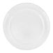 A close-up of a Tuxton Concentrix white china plate with a circular rim.