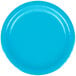 A close-up of a turquoise blue paper plate.