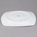 a white plate with a logo on it