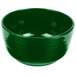 A green Tablecraft cast aluminum fruit bowl with a handle.