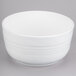 A white bowl with a curved edge.