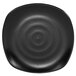 A black Elite Global Solutions square melamine plate with a spiral pattern.