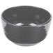 A black speckled Tablecraft fruit bowl with a black rim.