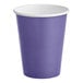 A purple paper cup with a white rim.