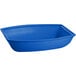 A cobalt blue cast aluminum oblong bowl with white interior.