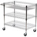 A Luxor three tiered wire mail cart with wheels.