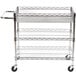 A Luxor chrome wire mail cart with three shelves and wheels.