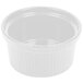 A Tablecraft white cast aluminum souffle bowl with ridges on a white background.