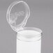 A white San Jamar pull-type cup dispenser with clear plastic cups inside.
