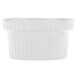 A white Tablecraft cast aluminum souffle bowl with ridges.