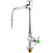 A silver T&S table faucet with a green knob.