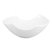 A white porcelain bowl with a unique curved design.