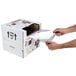 A person opening a box to reveal a Curtron Standard Grade replacement plastic sheet.