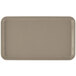 A rectangular desert tan Cambro tray on a counter.