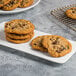 A plate of Regal California Select Raisin cookies on a table.