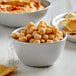 A bowl of Furmano's organic chickpeas served with chips.