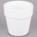 A Tablecraft white cast aluminum round condiment bowl with a lid.