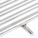 A close up of a MagiKitch'n stainless steel cooking grid.