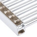 A MagiKitch'n heavy-duty stainless steel cooking grid with four holes.