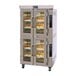 A Doyon double deck bakery convection oven with bread on two racks.