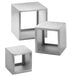 A silver metal Tablecraft Barclay 3 piece riser set with square cube shelves.