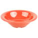 A Rio orange melamine bowl with a white interior.