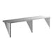 A heavy duty stainless steel wall shelf with three support brackets.