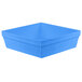 A cobalt blue square cast aluminum bowl with a white background.