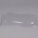 A clear plastic Fineline disposable plate with a curved edge.