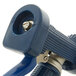 A T&S stainless steel pre-rinse spray valve with a blue rubber cover on the handle.