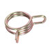 A close-up of a metal spring with a small hole in it.