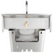 A stainless steel Eagle Group wall mount hand sink with faucet and knee pedals.