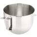 A KitchenAid stainless steel mixing bowl with a handle.