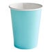 A pastel blue paper cup with a white rim.