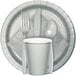 A Creative Converting shimmering silver paper plate with a fork, spoon, and knife.