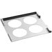A metal tray with four circles.
