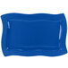 A blue Tablecraft rectangular platter with wavy edges.