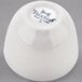 A white Tuxton eggshell sake cup.