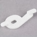 A white plastic Ketchum Manufacturing deli tag insert with a hole.