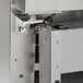 A stainless steel bottom left hinge pivot for an Avantco CFD Series door.